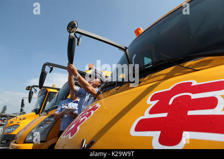 Chongqing, China. 29th Aug, 2017. Policemen check a school bus in Chongqing, southwest China, Aug. 29, 2017. Most of Chinese students is going to receive their new semester in September. Credit: Chen Shichuan/Xinhua/Alamy Live News Stock Photo