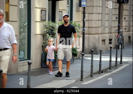 Milan, Borja Valero with her daughter in the center for the first time to know Milan The new purchase of INTER, the Spanish BORJA VALERO, bought by FIORENTINA, arrives for the first time in the center. Taking advantage of the championship stop, Borja Valero brings with her little daughter LUCIA around the city, and after walking all over the quadrilateral, she makes shopping in the 'Rinascente' in Corso Vittorio Emanuele. Stock Photo