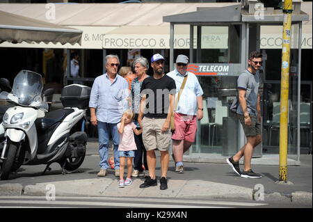 Milan, Borja Valero with her daughter in the center for the first time to know Milan The new purchase of INTER, the Spanish BORJA VALERO, bought by FIORENTINA, arrives for the first time in the center. Taking advantage of the championship stop, Borja Valero brings with her little daughter LUCIA around the city, and after walking all over the quadrilateral, she makes shopping in the 'Rinascente' in Corso Vittorio Emanuele. Stock Photo