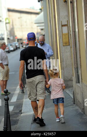 Milan, Borja Valero with her daughter in the center for the first time to know Milan The new purchase of INTER, the Spanish BORJA VALERO, bought by FIORENTINA, arrives for the first time in the center. Taking advantage of the championship stop, Borja Valero brings with her little daughter LUCIA around the city, and after walking all over the quadrilateral, she makes shopping in the 'Rinascente' in Corso Vittorio Emanuele. Stock Photo