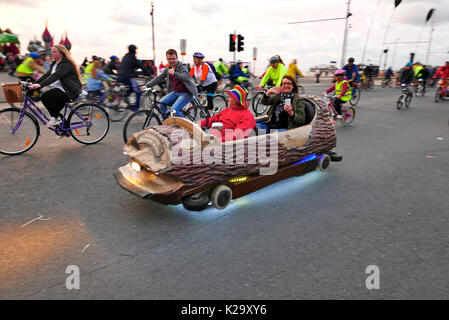 Blackpool, UK. 29th Aug, 2017. Ride the Lights annual cycling event through the illuminations. Blackpool UK   29th August 2017. Thousands of people with their bikes from around the north west of England  descend on Blackpool, Lancashire,  for the annual Ride the Lights event. For a period of three hours it was bicycles only along the promenade for families and individuals to appreciate the illuminations in a vehicle and pollution free environment. Even a carriage from a log fume funfair ride took part. Kev Walsh/Alamy Live News Stock Photo