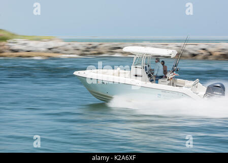 West Palm Beach, Florida, USA. 30th Aug, 2017. A pair of boaters are seen piloting a boat into the Jupiter Inlet near DuBois Park in Jupiter, Fla., on Wednesday, August 30, 2017 Credit: Andres Leiva/The Palm Beach Post/ZUMA Wire/Alamy Live News Stock Photo