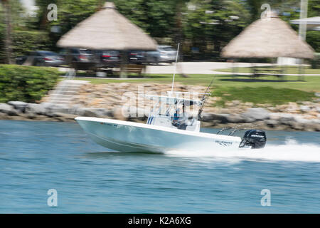 West Palm Beach, Florida, USA. 30th Aug, 2017. A pair of boaters are seen piloting a boat into the Jupiter Inlet near DuBois Park in Jupiter, Fla., on Wednesday, August 30, 2017 Credit: Andres Leiva/The Palm Beach Post/ZUMA Wire/Alamy Live News Stock Photo