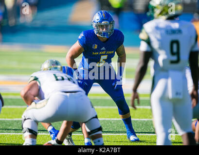 Miami, Florida, USA. 25th Aug, 2018. 58 Ginda tackling #35 Edwards in the  4th quarter during