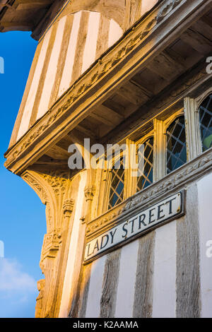 English medieval, detail of the jettied oak front of the Guildhall, a well preserved medieval half timbered hall house in Lavenham, Suffolk, England Stock Photo