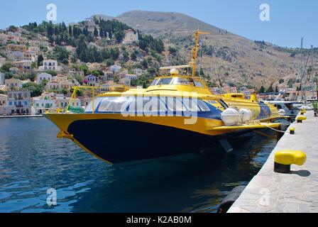 Aegean Prince II hydrofoil moored in Yialos harbour on the Greek island of Symi on June 19, 2011. The 35mtr vessel was built in 1981 in Georgia. Stock Photo