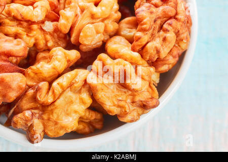 Close up picture of walnuts in a bowl, shallow depth of field. Stock Photo