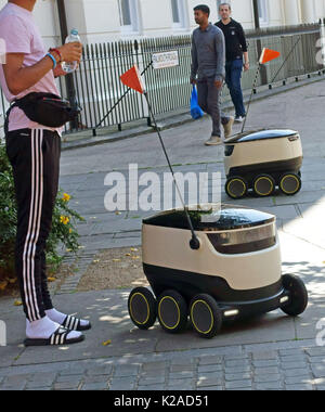 Food delivery robot vehicle by Starship Technologies on trial in London SE1 Stock Photo