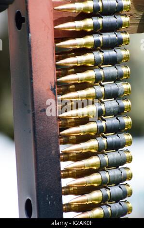 Belt of Machine Gun Bullets Stock Photo