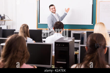 Open-space office and successful team and smiling boss Stock Photo