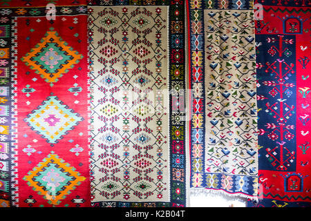 Chiprovtsi Carpets (rugs). Traditional colorful carpets from Chiprovtsi region in Bulgaria. Hand-woven (hand-made) carpets with different elements and Stock Photo