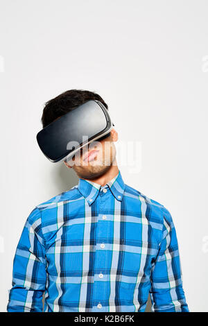 Talented Designer Using VR Goggles Stock Photo