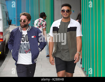 Nathan Henry (right) and Aaron Chalmers from the cast of Geordie Shore attends a photocall outside the MTV studios, London, ahead of the first episode of Season 15 which airs tonight. Stock Photo