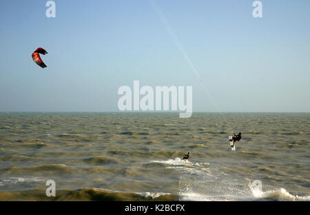 AJAXNETPHOTO. WORTHING, ENGLAND. - A KITE SURFER WAVE JUMPING OFF THE COAST IN HIGH WINDS. PHOTO:JONATHAN EASTLAND/AJAX REF:R61209 1143 Stock Photo
