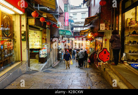 Jiufen, Taiwan - Jan 7, 2016. People walking on main street at the night market in Jiufen, Taiwan. Jiufen is a mountain area in the Ruifang District n Stock Photo