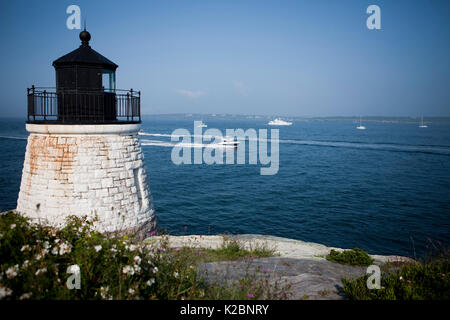 Castle Hill Lighthouse andMinor Offshore 31 leaves Newport Rhode Island, USA, August 2009. Stock Photo