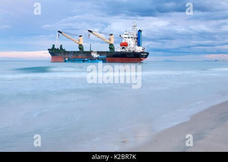 Container ship stranded on El Saler Beach, Valencia, Spain. All non-editorial uses must be cleared individually. Stock Photo