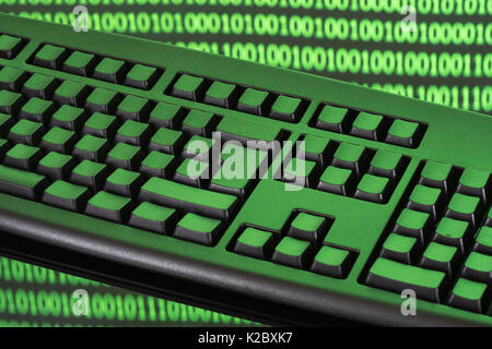 Black keyboard + binary code - for online transactions, cybercrime darkweb, hacking, cyberattack, data protection cyber-theft, 1s and 0s, hacktivism. Stock Photo