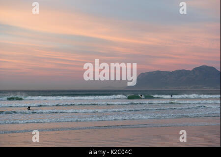 Sunrise over False Bay, Atlantic Ocean, Muizenberg Beach, near Cape Town, Western Cape, South Africa. Stock Photo