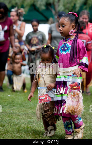 Two Native American children participate in a candy dance. Stock Photo