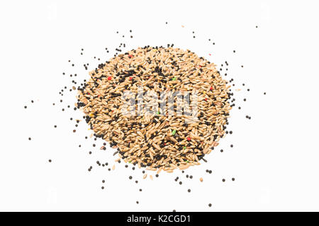 Mixed bird seed isolated on white background Stock Photo