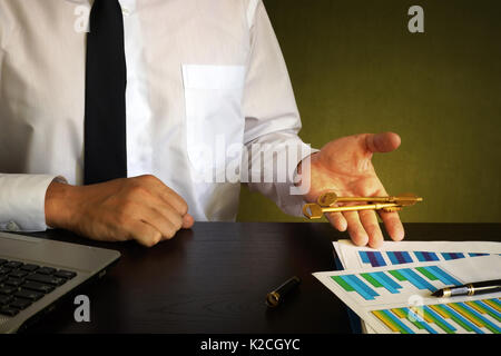 Man takes keys from house or flat. Real estate concept. Stock Photo