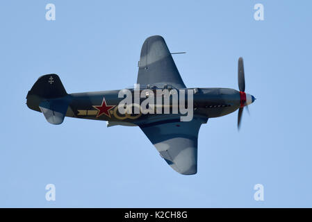 Will Greenwood flying his Yakovlev Yak 3 fighter at the Little Gransden Children in Need airshow Stock Photo