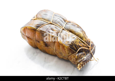 pile smoked fish on a white background. smoked salmon isolated on marble Stock Photo