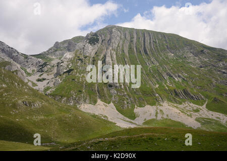 Vertically folded limestone rock layers of Prutas Mountain, Durmitor National Park, Montenegro, July 2014. Stock Photo