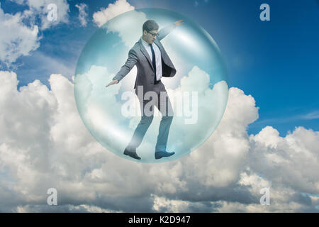 Businessman flying inside the bubble Stock Photo