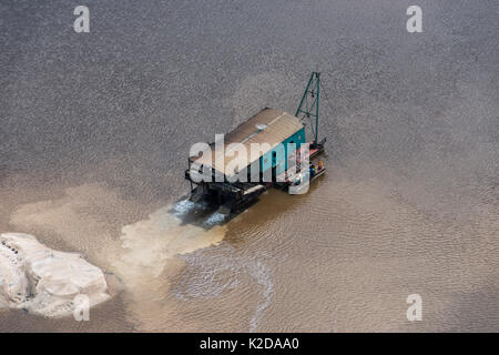 Aerial view of gold dredger in Essequibo river, Guyana South America Stock Photo