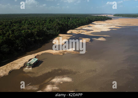 Gold dredger on Essequibo river, the longest river in Guyana, South America Stock Photo