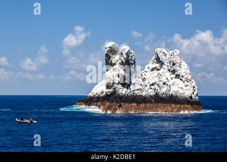 Roca Partida,  a small rock island covered in white bird guano  in the Revillagigedo Archipelago Biosphere Reserve, Socorro Islands, Western Mexico Stock Photo