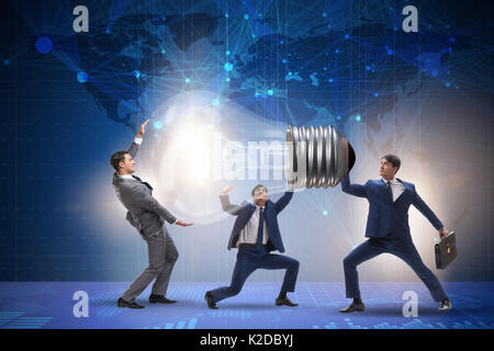 Businessmen in bright idea concept Stock Photo