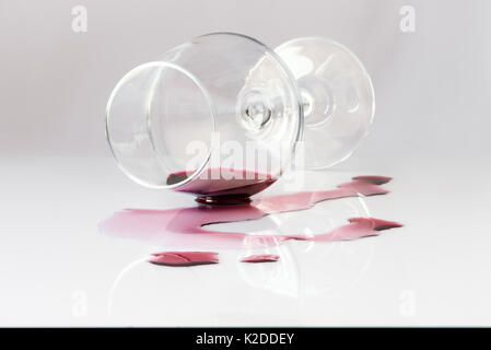 Spilled glass of red wine Stock Photo