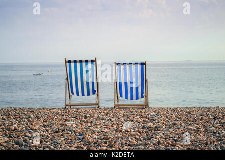 Deckchairs on Brighton Beach, Brighton, Sussex, UK, 2017 Stock Photo