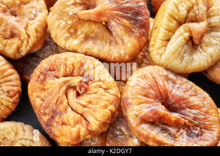 Extreme close up picture of dried figs, shallow depth of field. Stock Photo