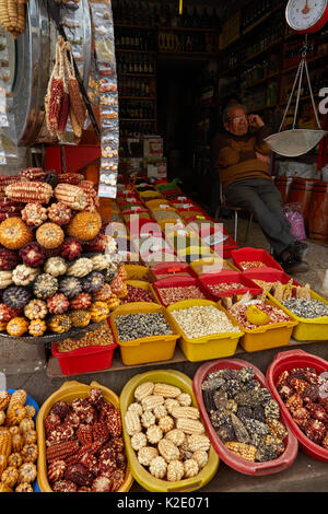 Shopkeeper selling many types of Peruvian corn, San Pedro Market, Cusco, Peru, South America Stock Photo