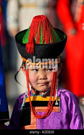 Little girl in traditional Deel clothes, festival of Mongolian national ...