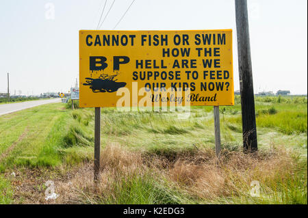 Protest sign by road during Deepwater Horizon oil spill, Louisiana, Gulf of Mexico, USA, August 2010 Stock Photo