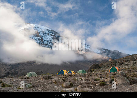 Camp beneath the summit on the Machame Trail, Mount Kilimanjaro, Tanzania. May 2008 Stock Photo