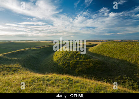 Western ramparts of Maiden Castle, an Iron Age hill fort near Dorchester, Dorset, England, UK, July. Stock Photo