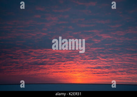 Autumn sunrise over the eastern Beaufort Sea, off Arctic coast, Alaska Stock Photo