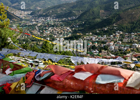 Prayer flags on hill above the city of  Thimphu. Bhutan, October 2014. Stock Photo