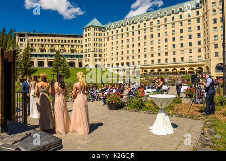 Wedding ceremony at the Fairmont Chateau Lake Louise in canadian Rocky Mountains. Stock Photo