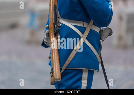 The life guard dragoons at the change of guards at the Royal castle in Stockholm, Sweden. They are all wearing historic uniforms. Stock Photo