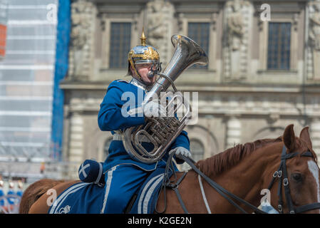 The life guard dragoons at the change of guards at the Royal castle in Stockholm, Sweden. They are all wearing historic uniforms. Stock Photo