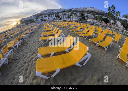 Deck chairs on the beach, Puerto Rico, Gran Canaria, Spain Stock Photo