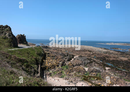 Great Britain, Jersey Island, cliffs and plants on Corbiere Bay Stock Photo  - Alamy
