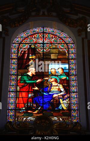 Stained glass window inside St Pauls Cathedral also known as Mdina Cathedral, Mdina, Malta, Europe. Stock Photo